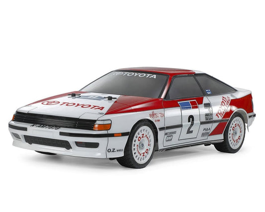 Tamiya TT-02 Tamiya Toyota Celica GT-Four 1/10 4WD Electric Touring Rally Kit: Pre-Painted Body)